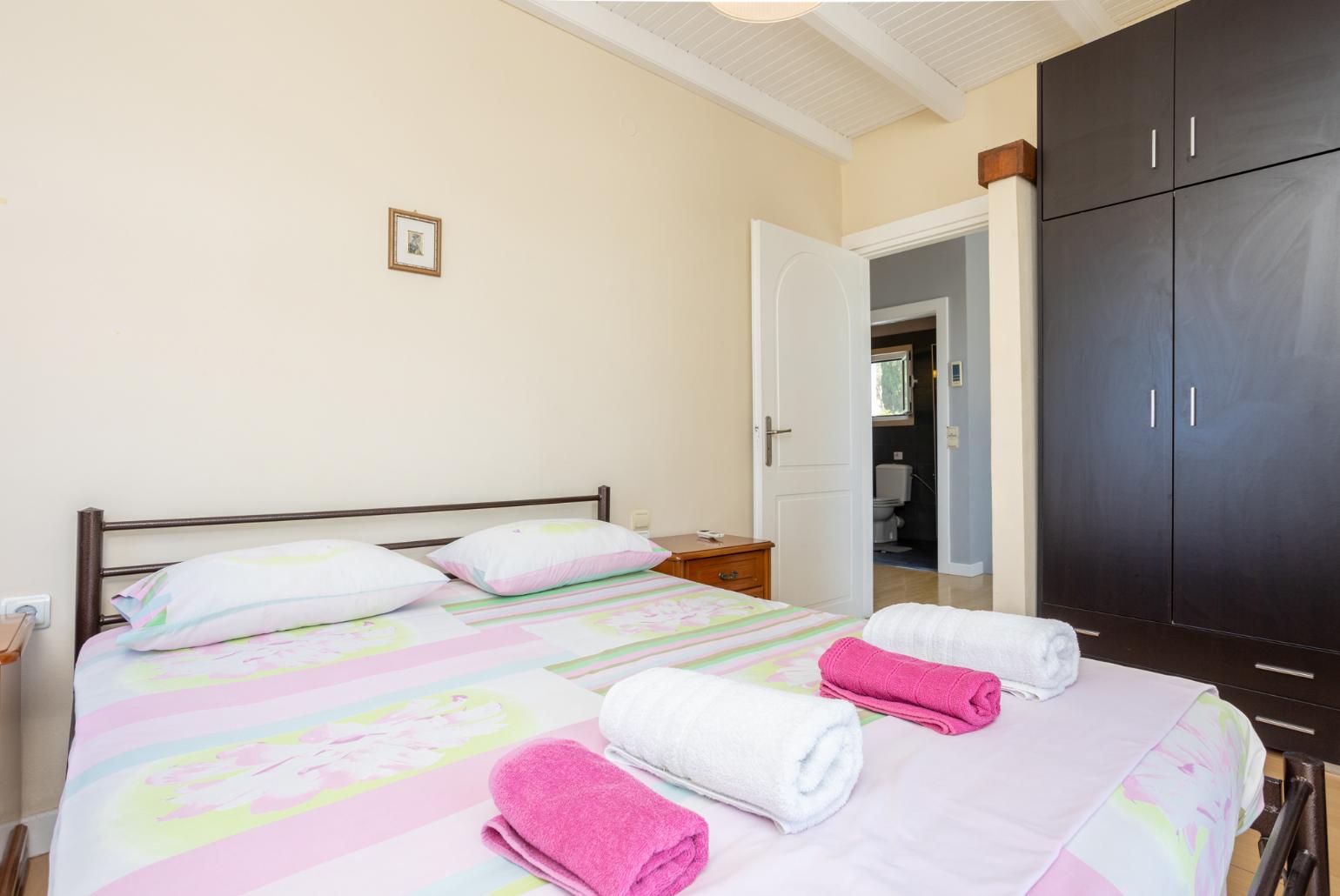 Double bedroom with A/C and balcony access
