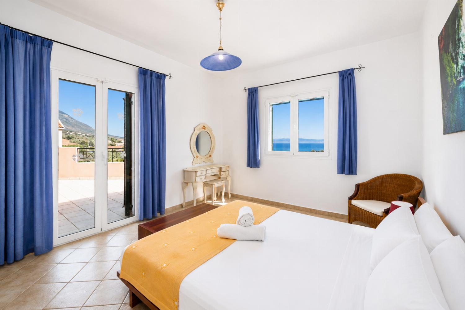 Double bedroom with en suite bathroom, A/C, and sea views