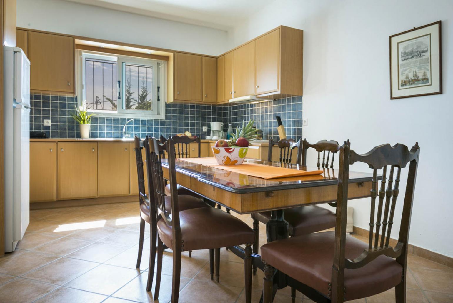 Equipped kitchen and dining area