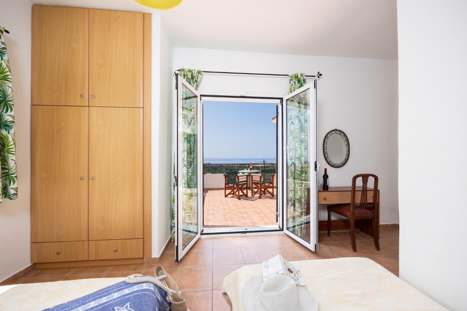 Twin bedroom with en suite bathroom and A/C