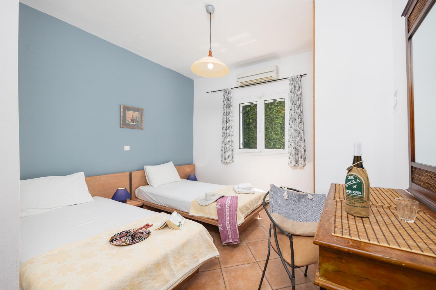 Twin bedroom with A/C