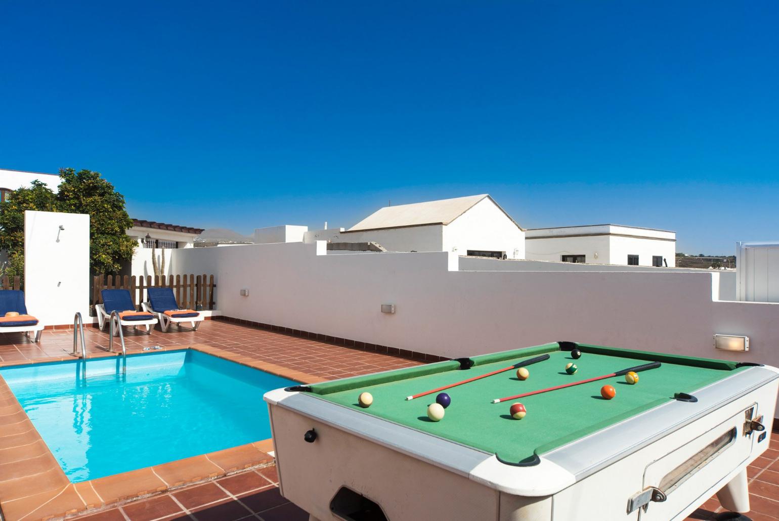 Private pool with terrace area and pool table