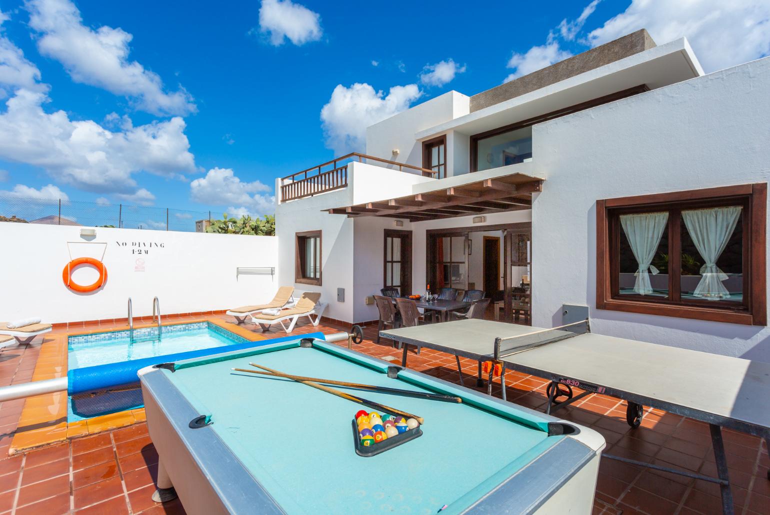 Terrace area with pool table and table tennis