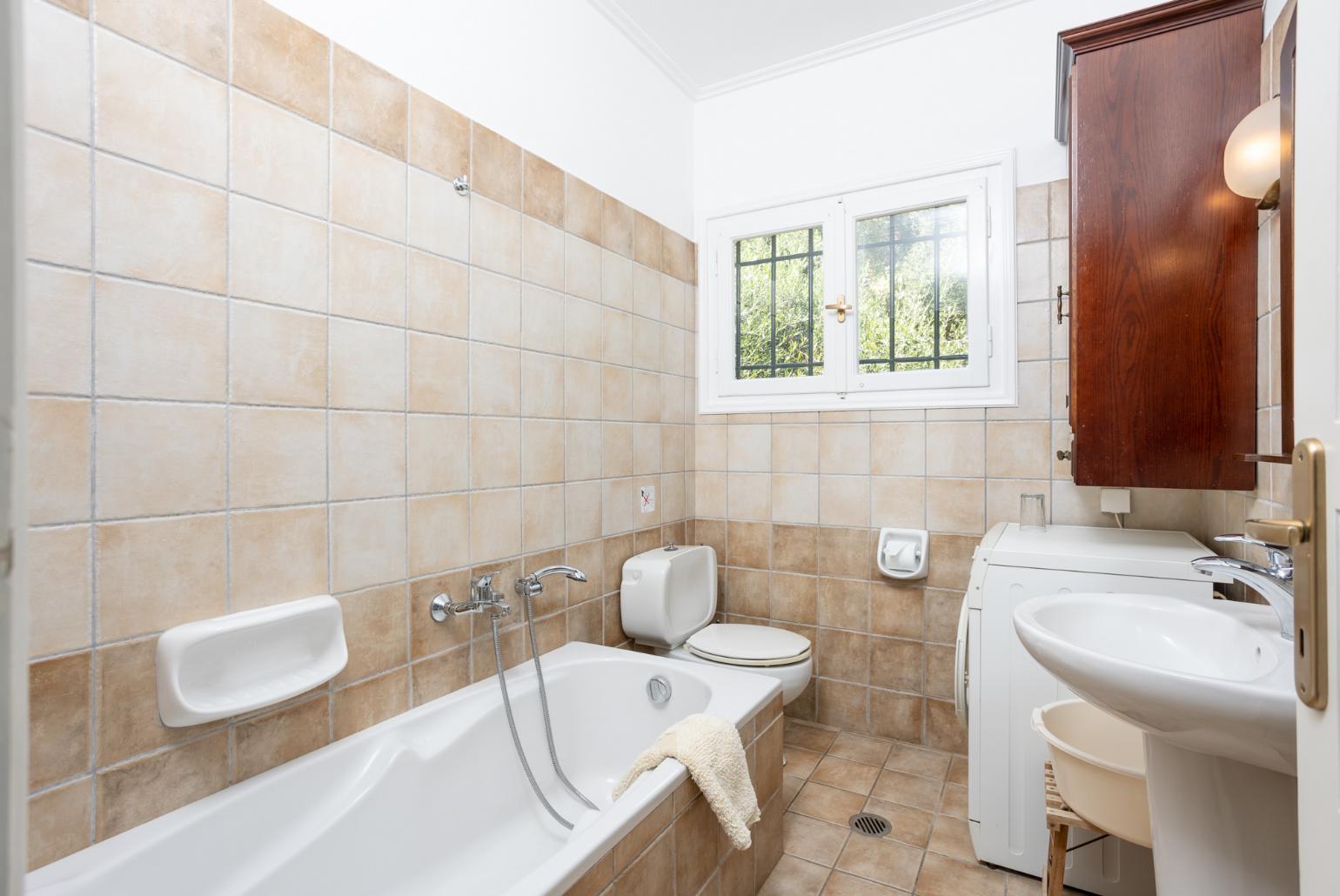 Family bathroom with bath and shower