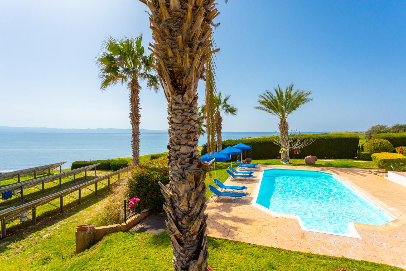 Private pool, terrace, and garden with panoramic sea views