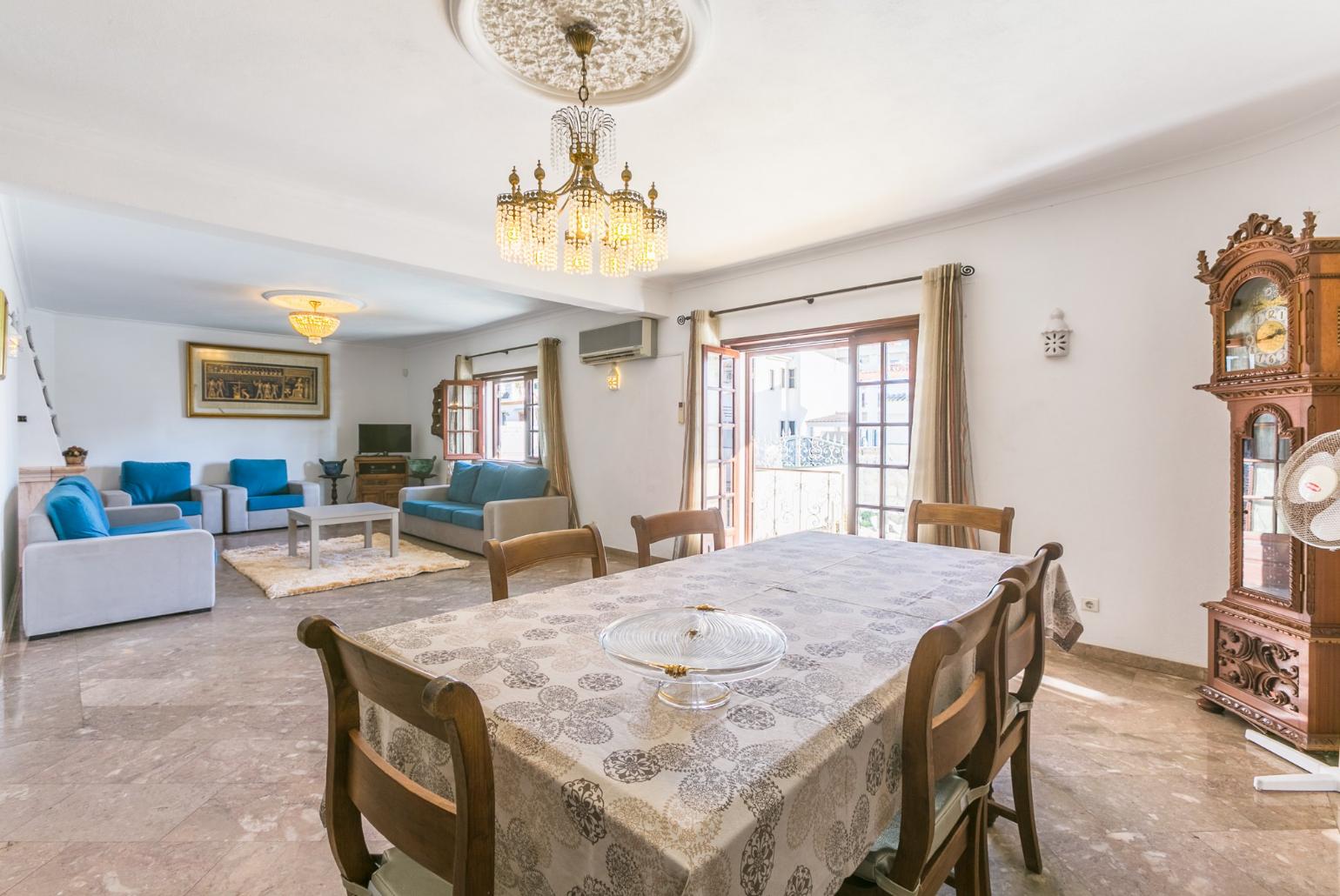 Open-plan living room with dining area 