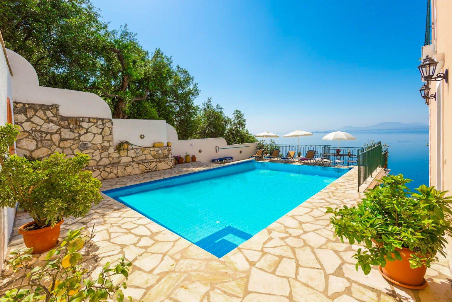 Private pool, terrace area, and sea views