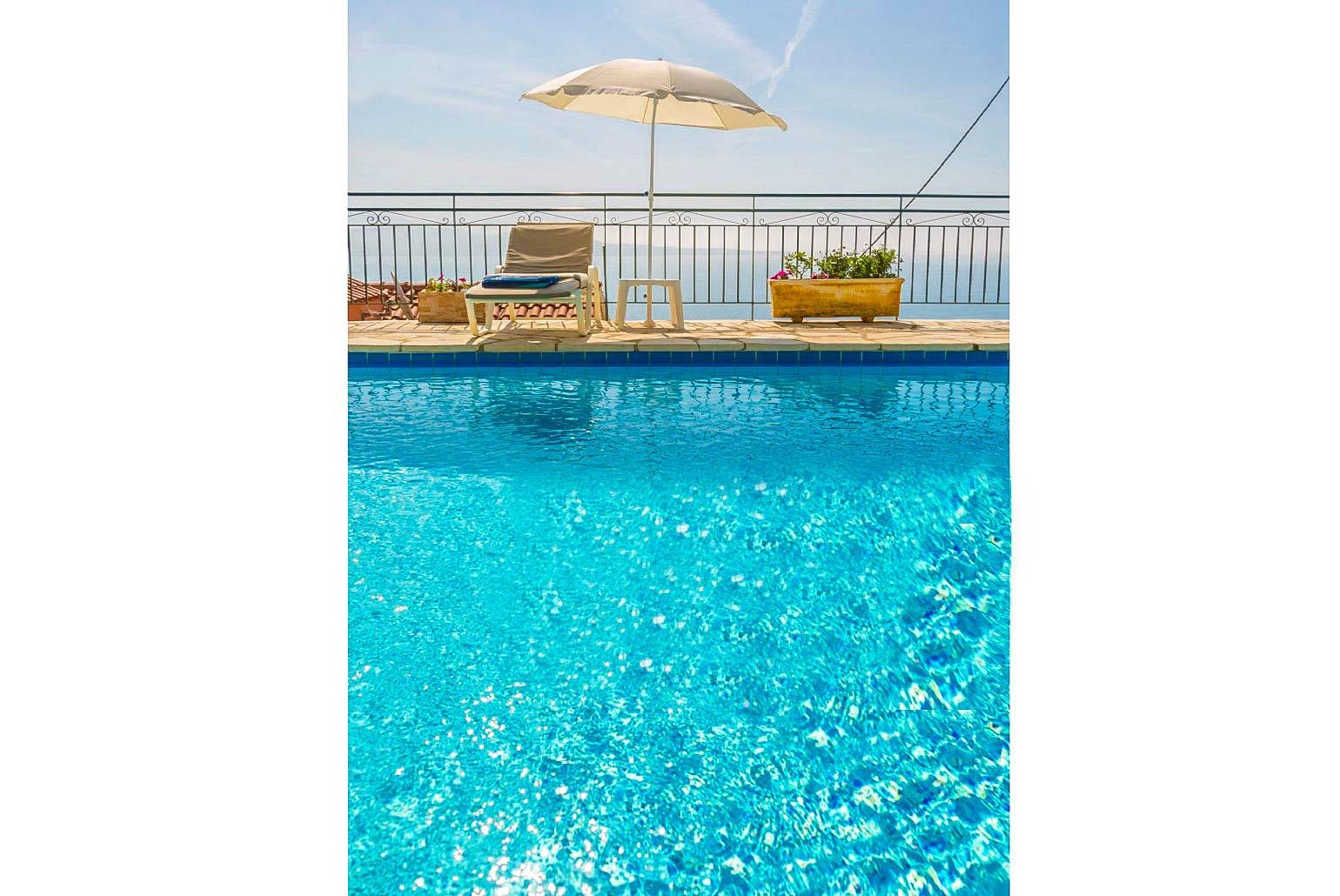 Private pool and terrace with panoramic sea views
