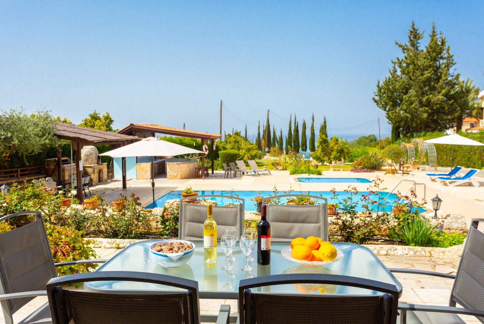 Private pool, terrace, and garden with sea views