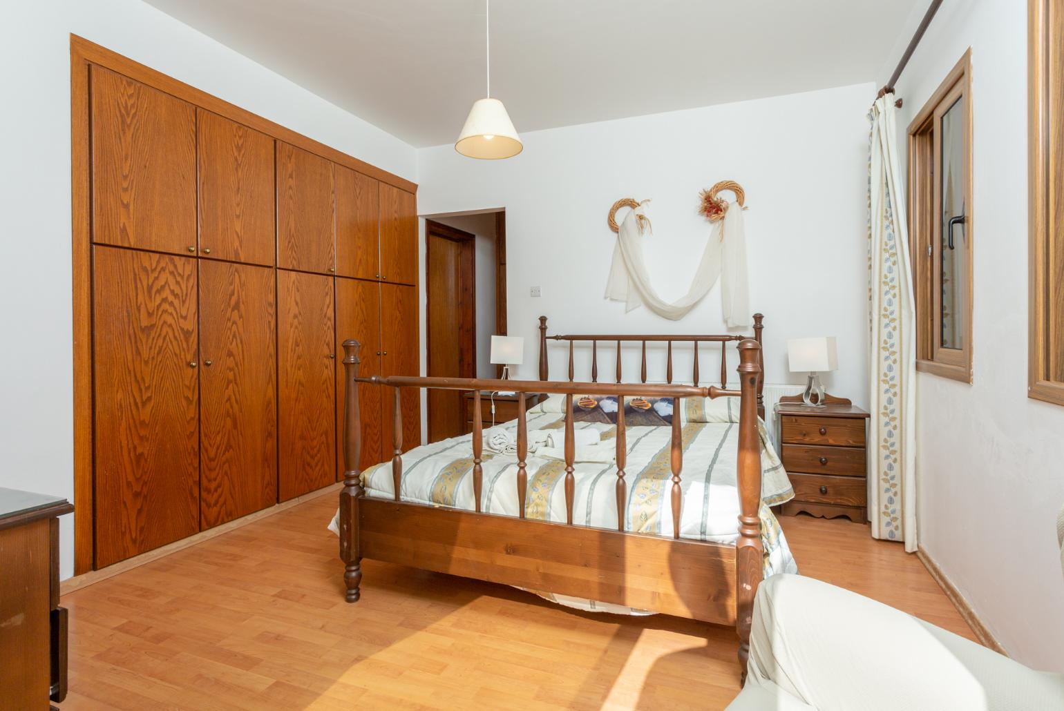 Double bedroom with en suite bathroom, A/C, and balcony access with sea views 