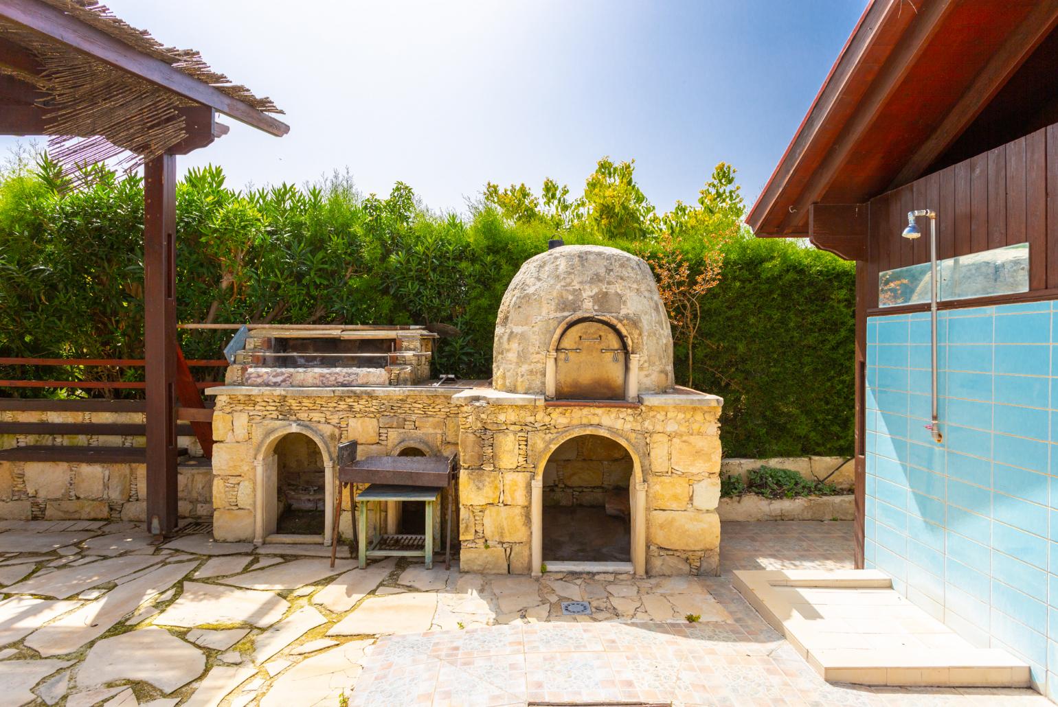 BBQ area with wood fired oven