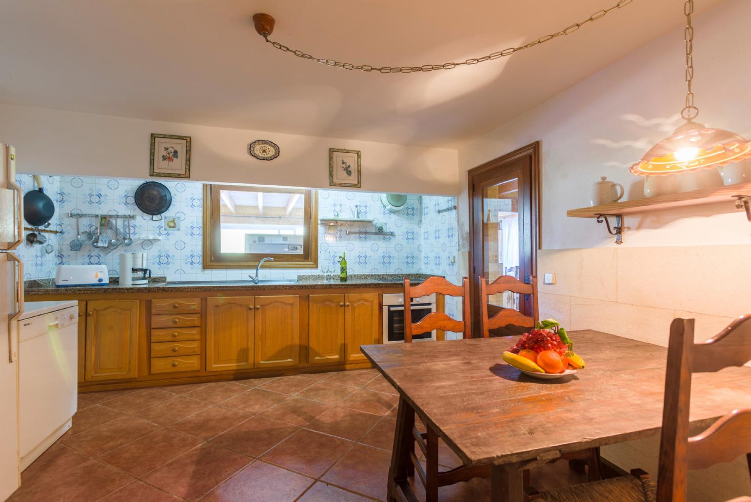 Equipped kitchen and dining area