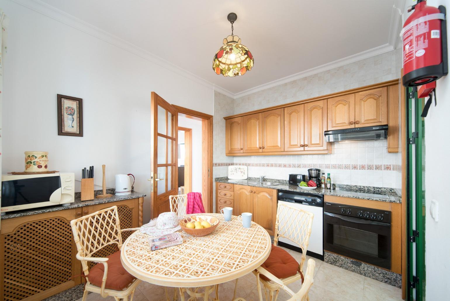 Equipped kitchen and dining area