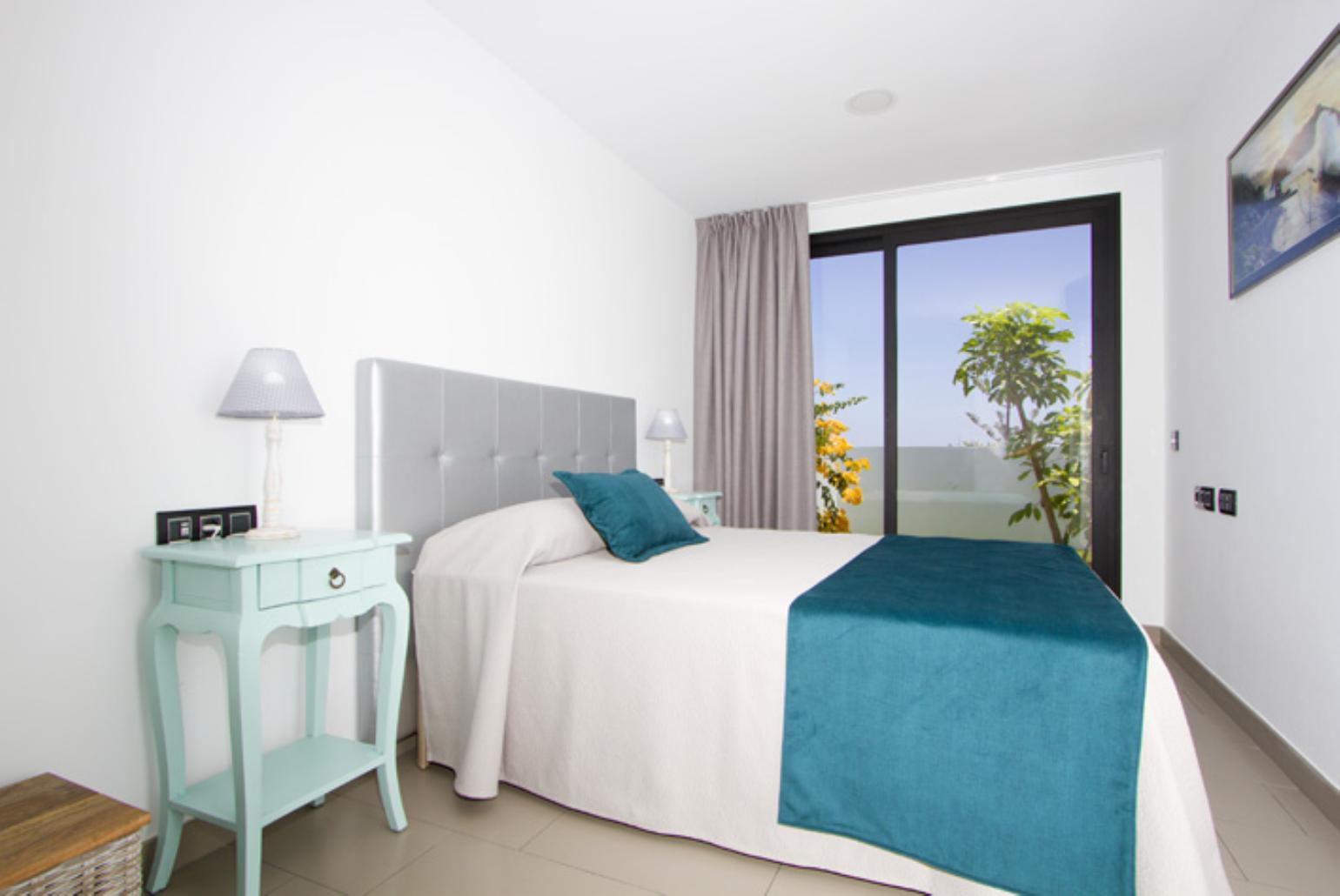 Double bedroom with A/C, en suite bathroom and balcony access
