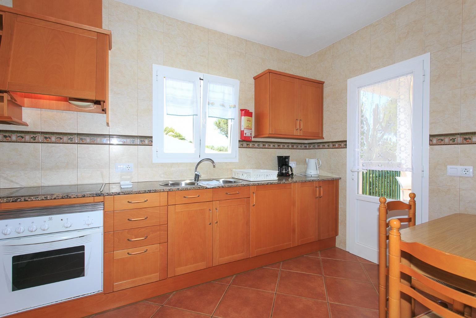 Equipped kitchen and dining area