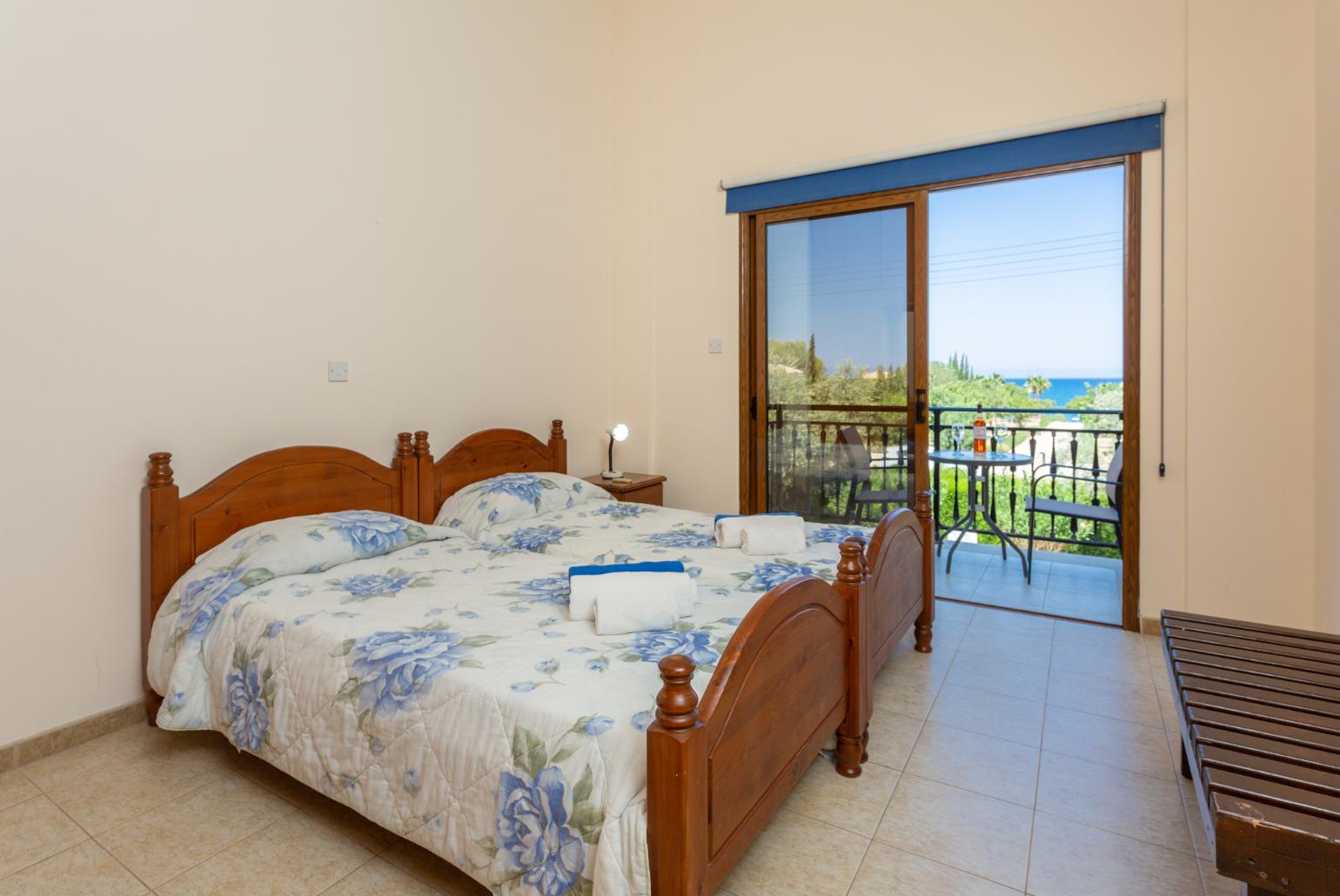 Twin bedroom with A/C and balcony with sea views