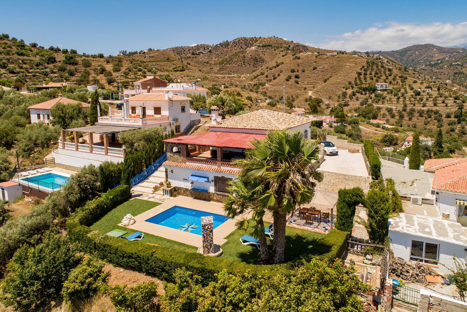 Aerial view of the  villa and pool 