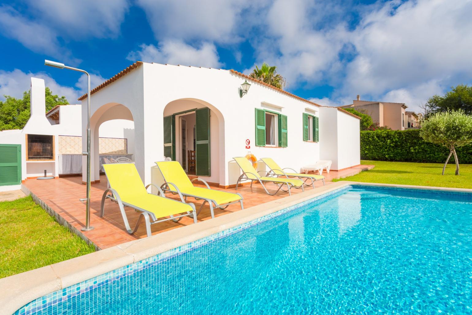 Beautiful villa with private pool, partially sheltered terrace, and lawn
