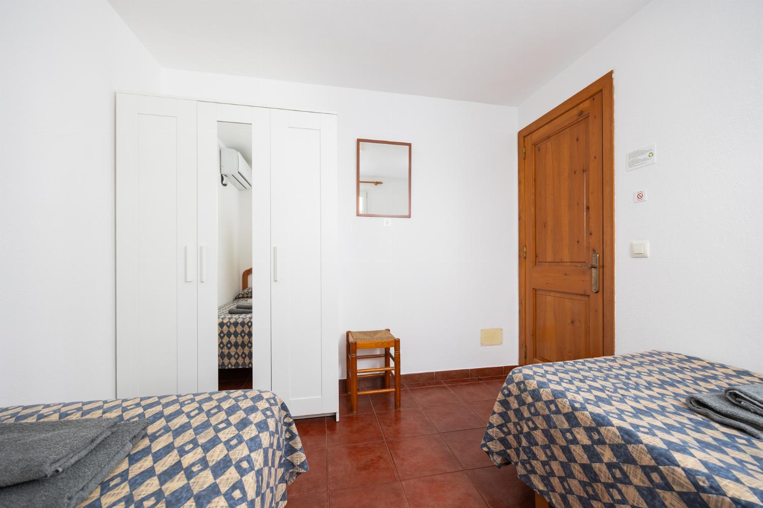 Twin bedroom with A/C