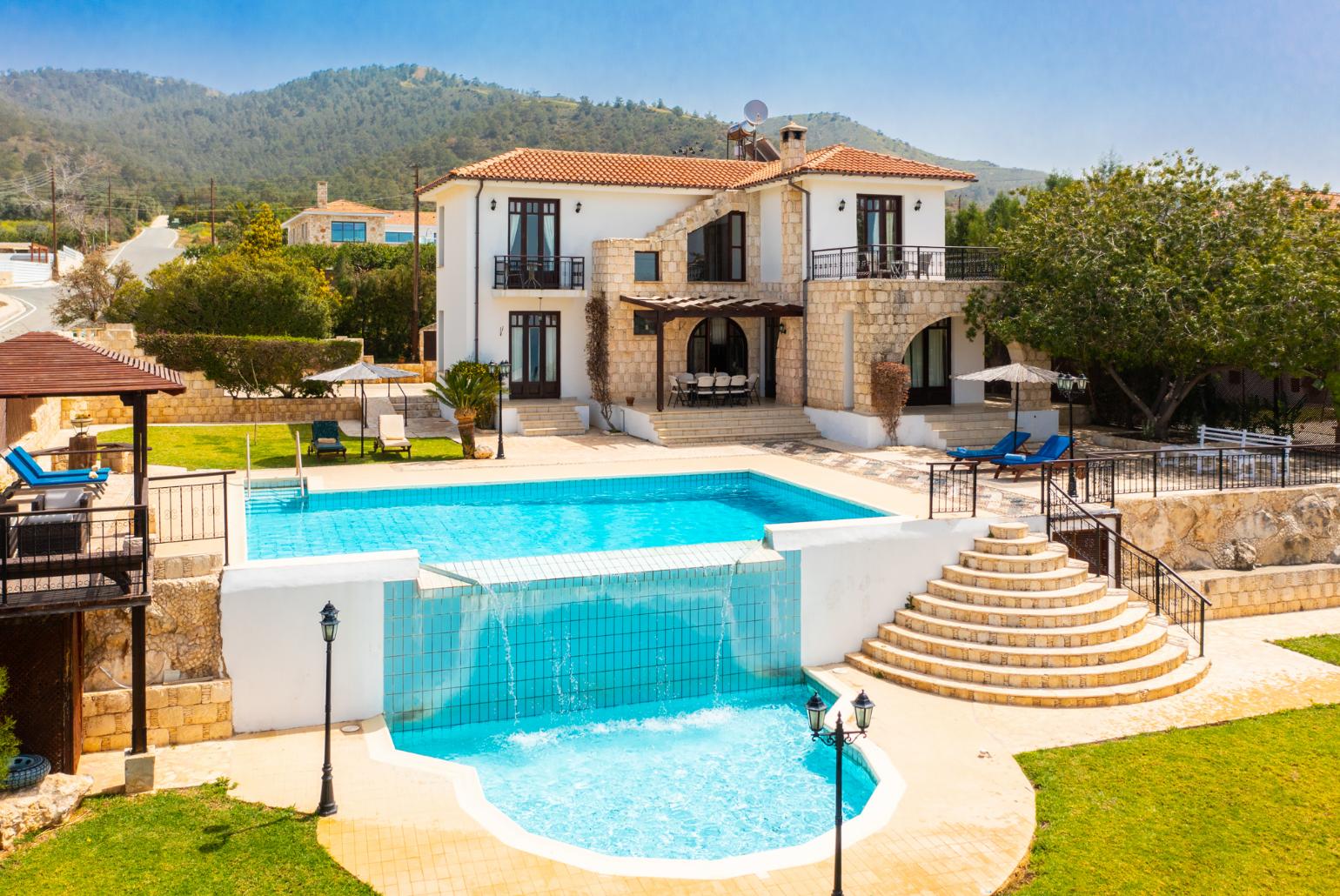 ,Beautiful villa with private infinity pool, terrace, and garden with panoramic sea views