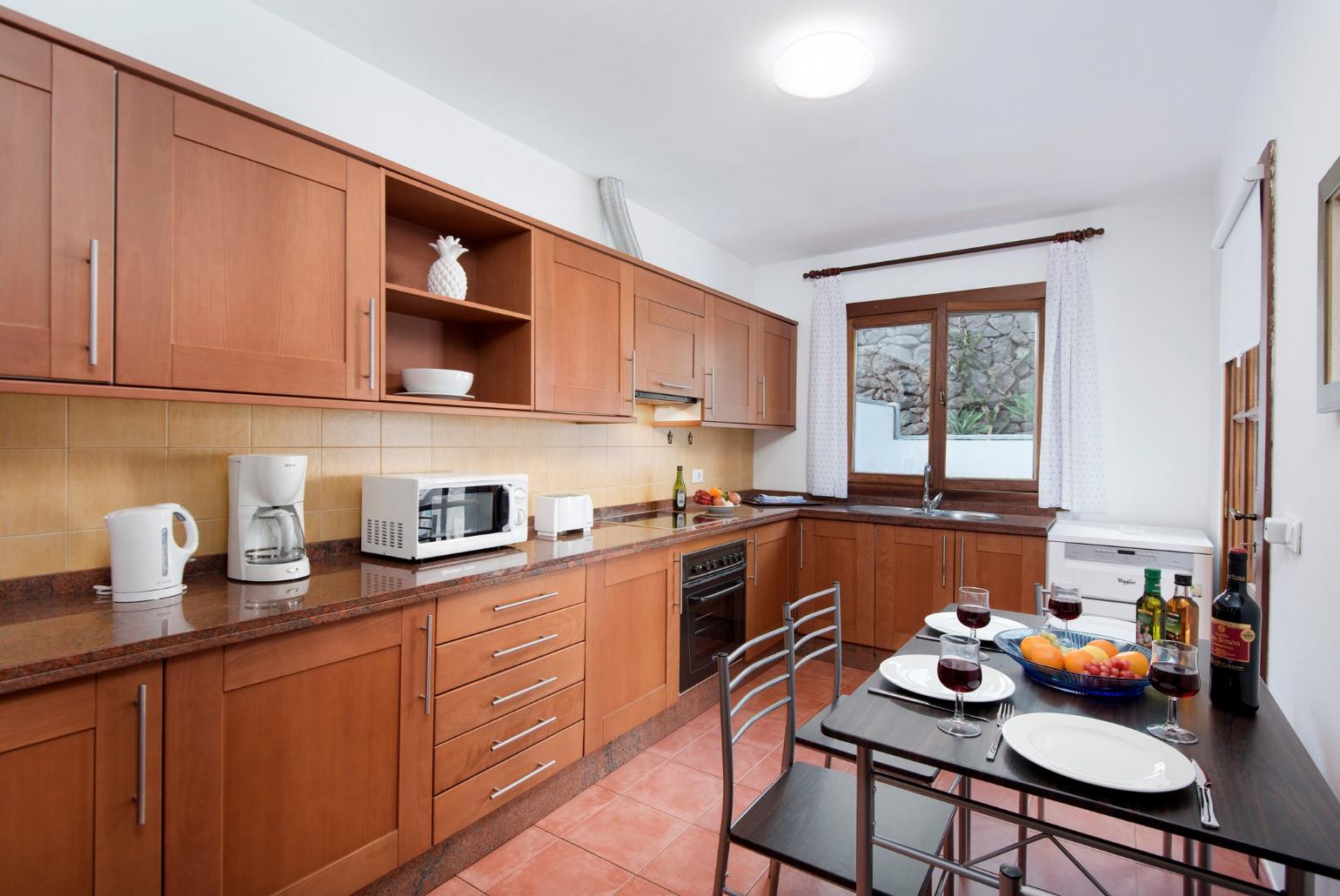 Equipped kitchen and dining area