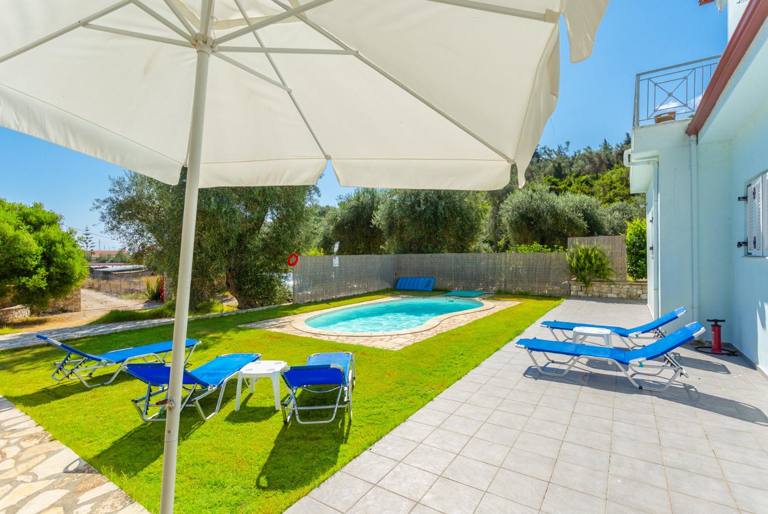 Private pool, terrace, and garden area