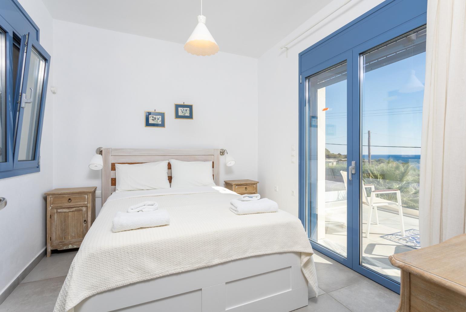 Double bedroom with A/C, sea views, and upper terrace access