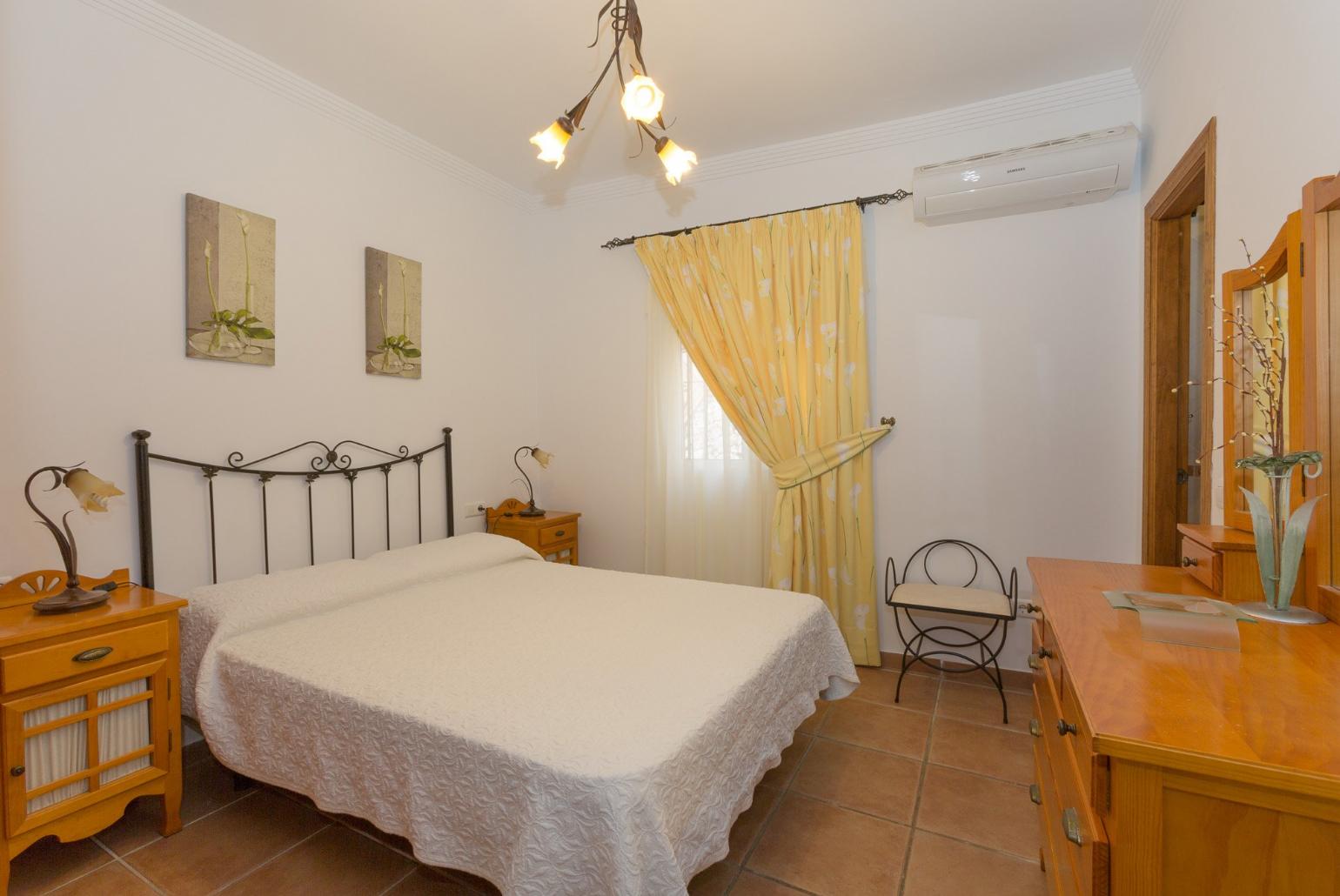 Double bedroom with A/C and en suite bathroom.