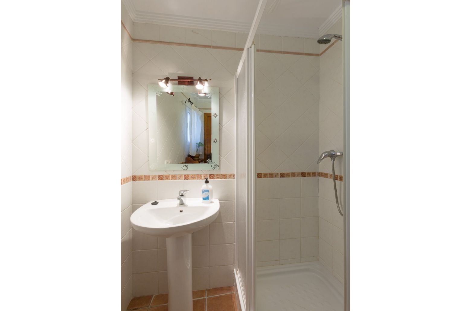 En suite bathroom with shower.