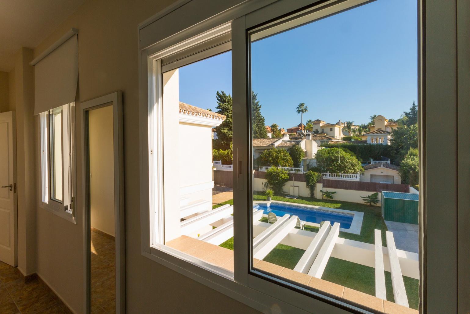 Double bedroom with A/C and balcony access