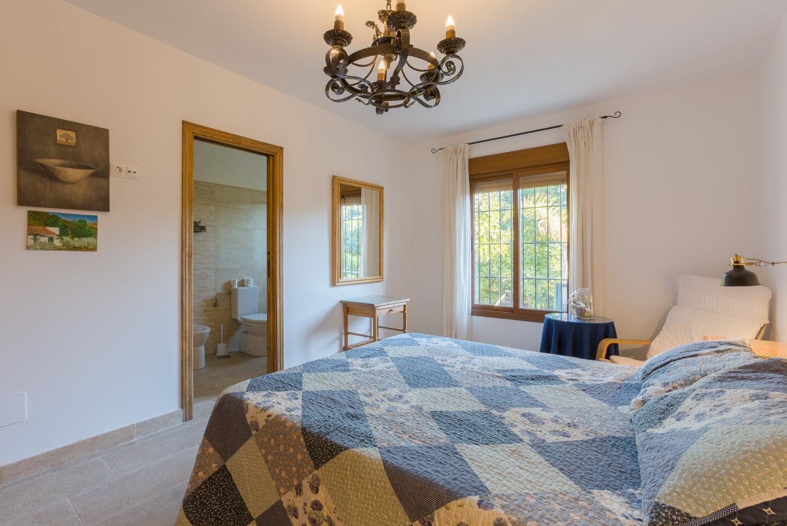 Double bedroom with A/C and en suite bathroom