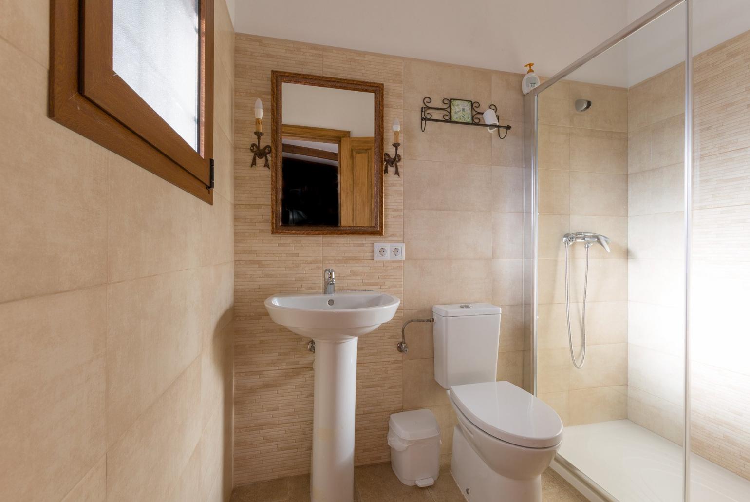 Family bathroom with shower. W/C.