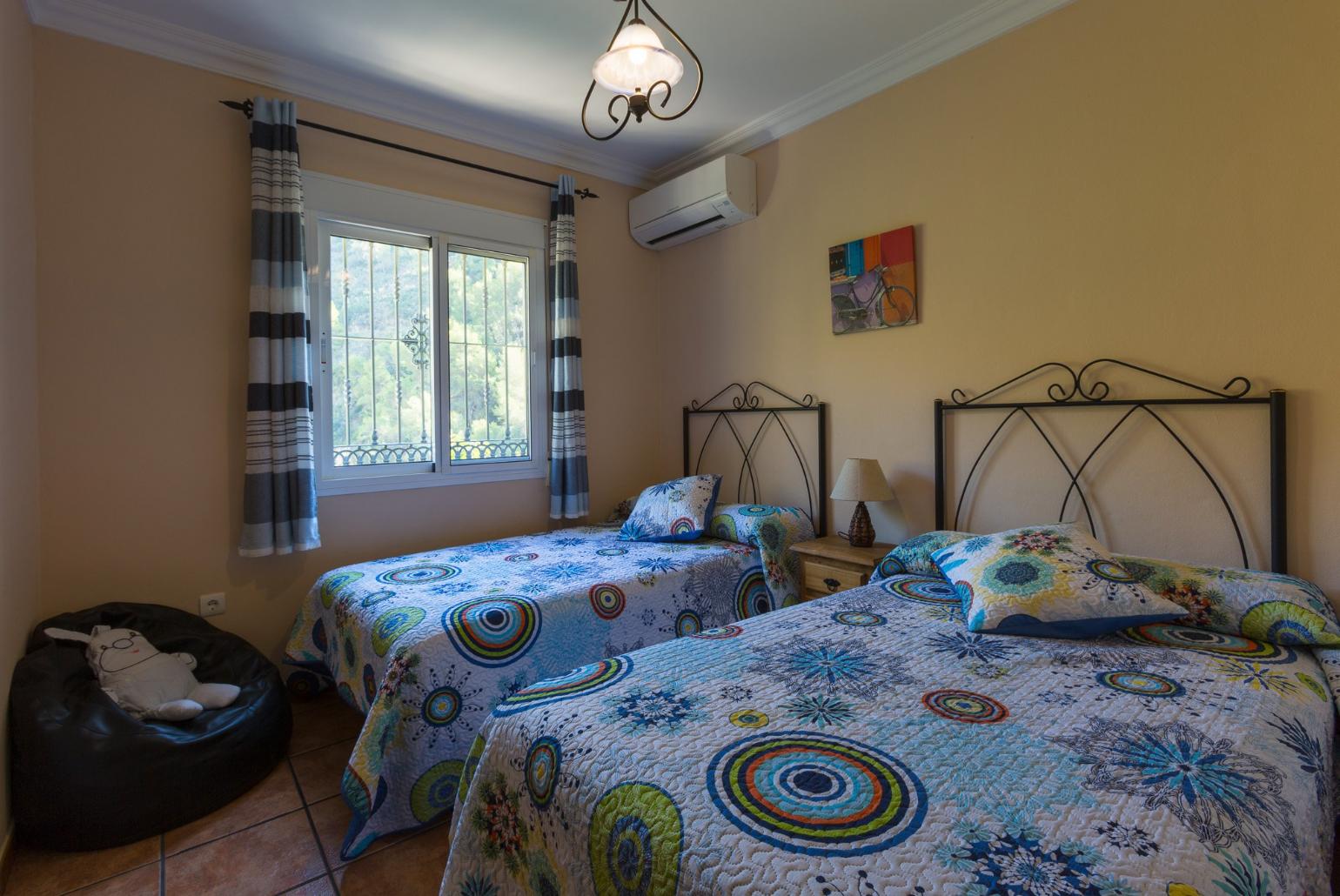 Twin bedroom with A/C