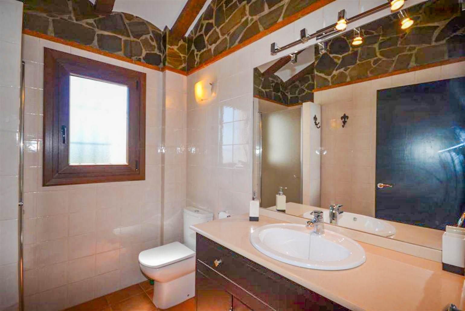 Family bathroom with shower. W/C.