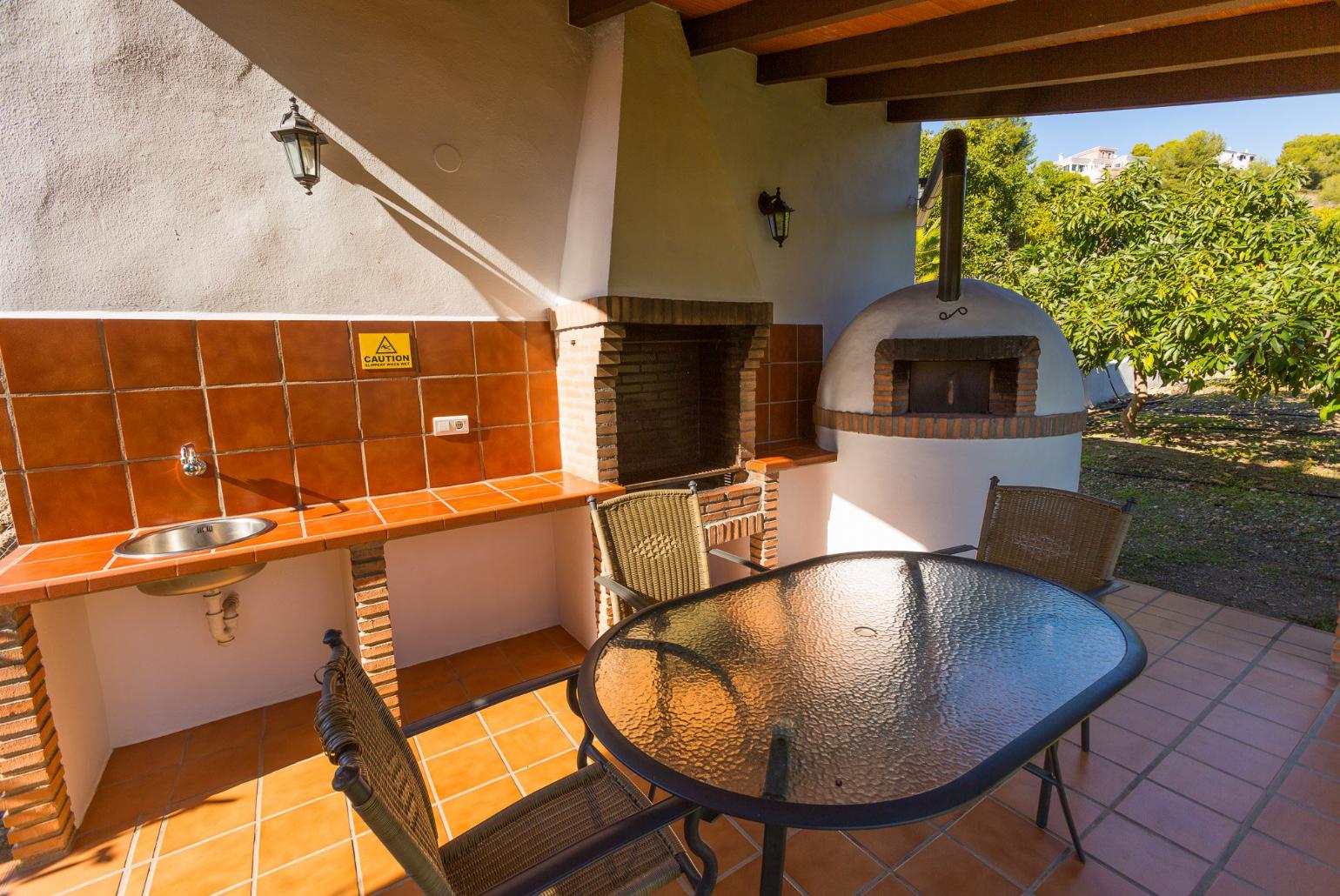 Sheltered terrace area with BBQ