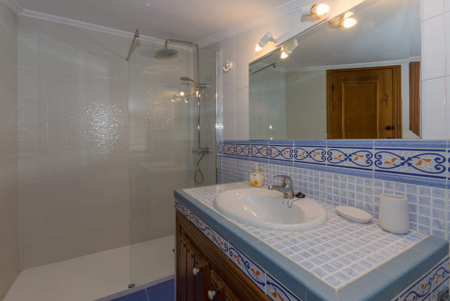 Family bathroom with shower. W/C.