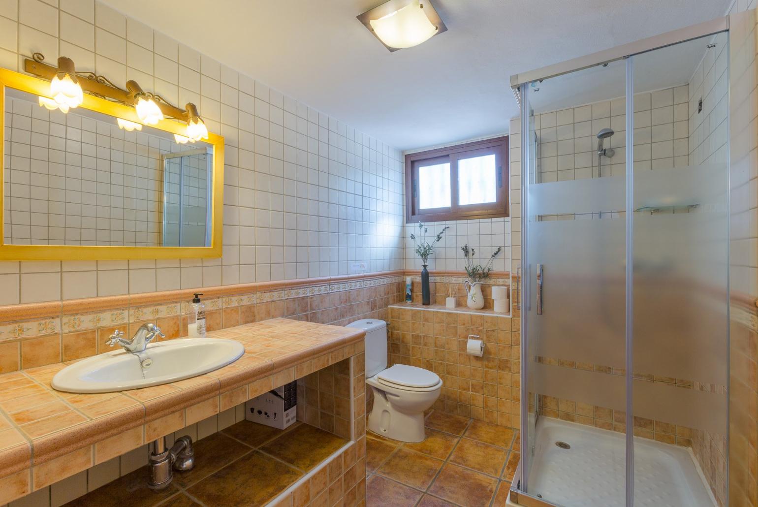 Family bathroom with shower. W/C.
