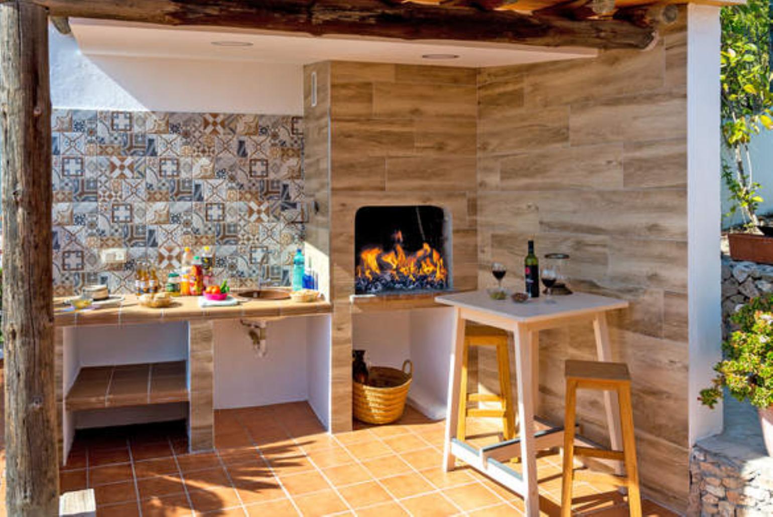 Sheltered terrace area with BBQ