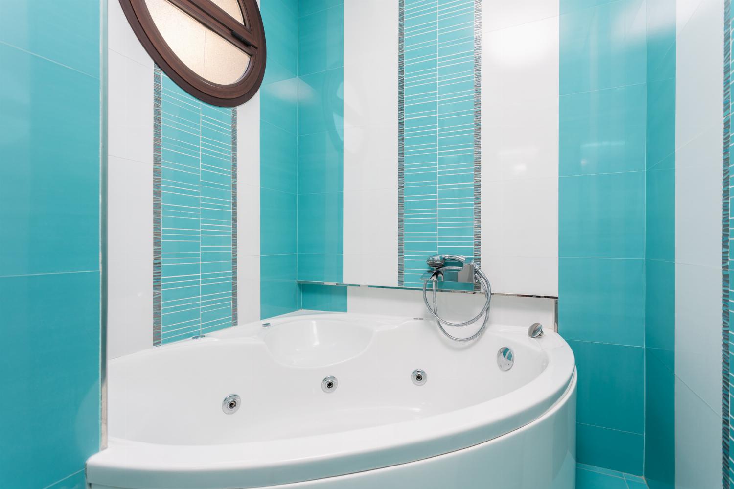 Family bathroom with bath and shower