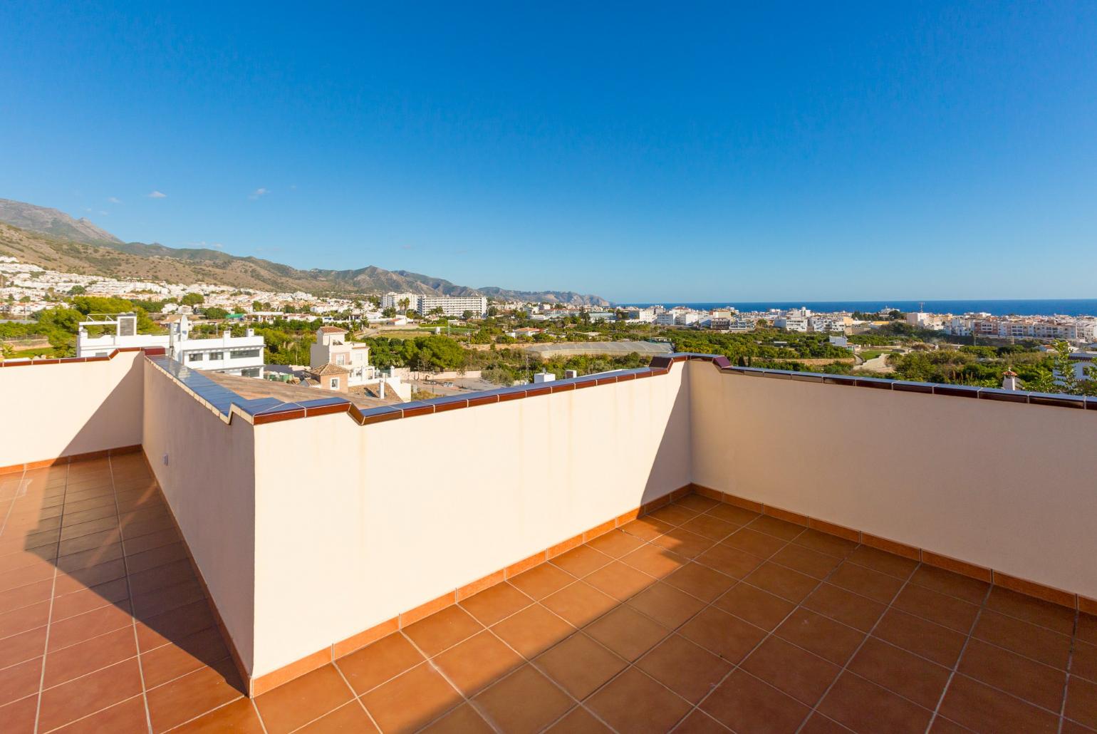 Roof terrace area with sea views