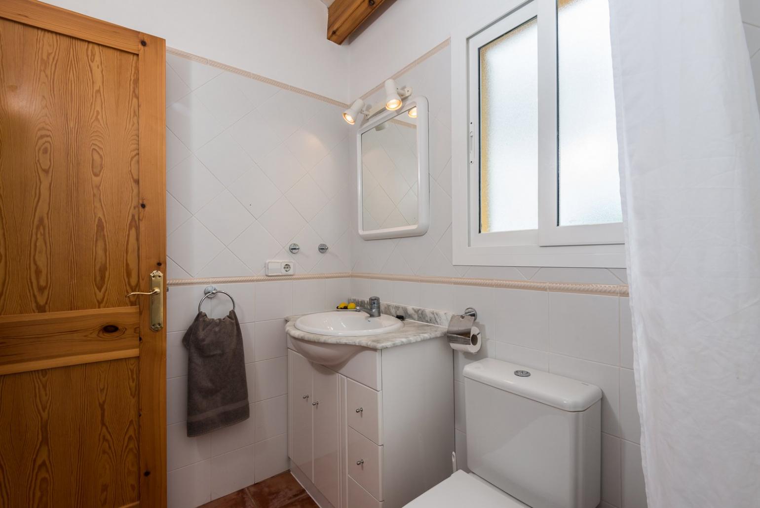 Family bathroom with bath and shower. W/C.