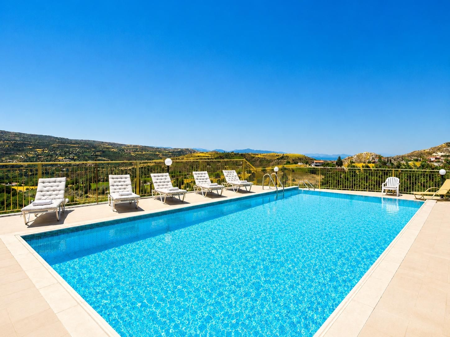 Large private pool with sun loungers and beautiful panoramic countryside views.