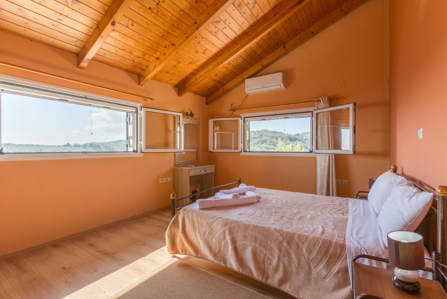 Double bedroom on first floor with A/C and sea views