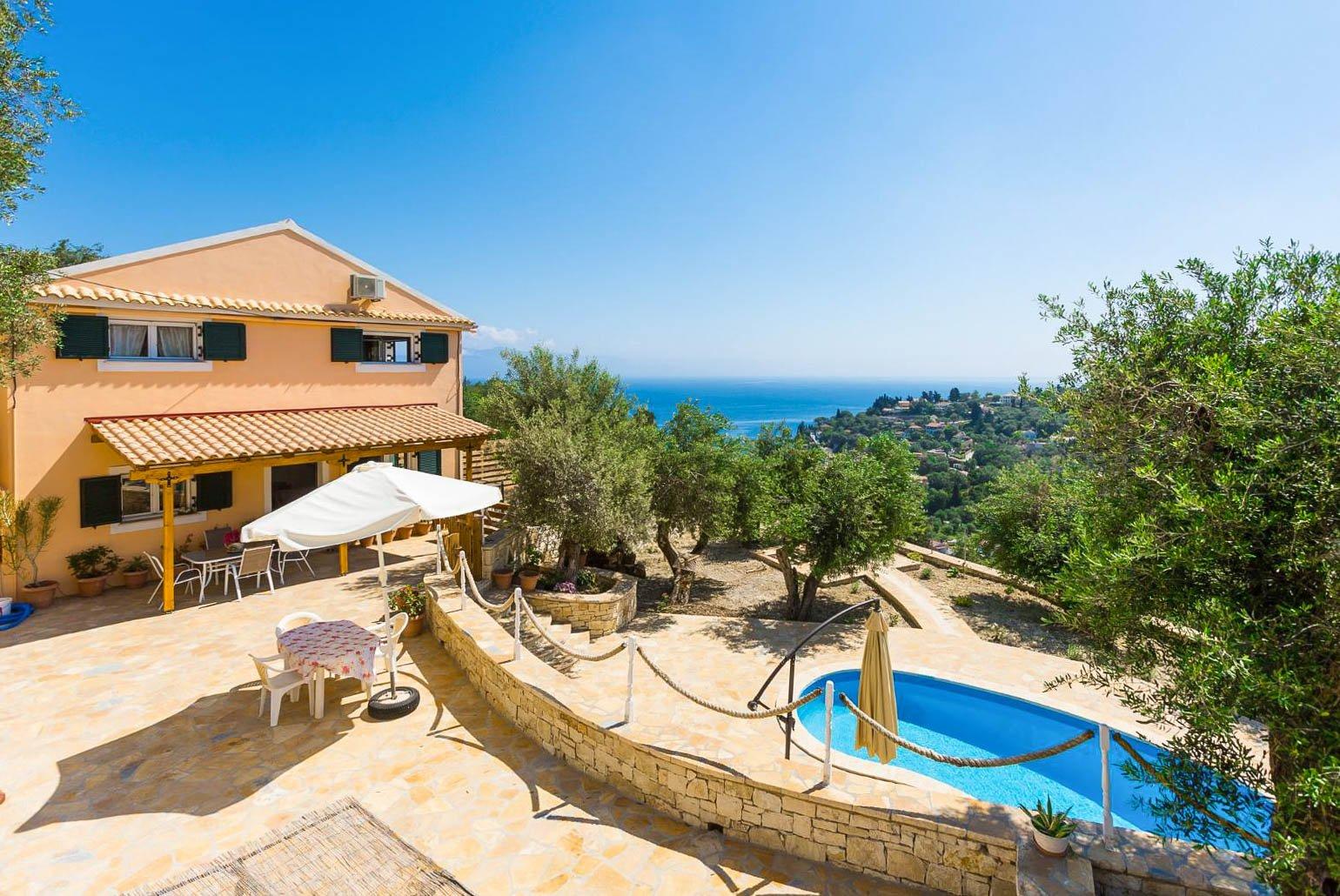 Beautiful villa with private pool, multi-level terrace area, and sea views