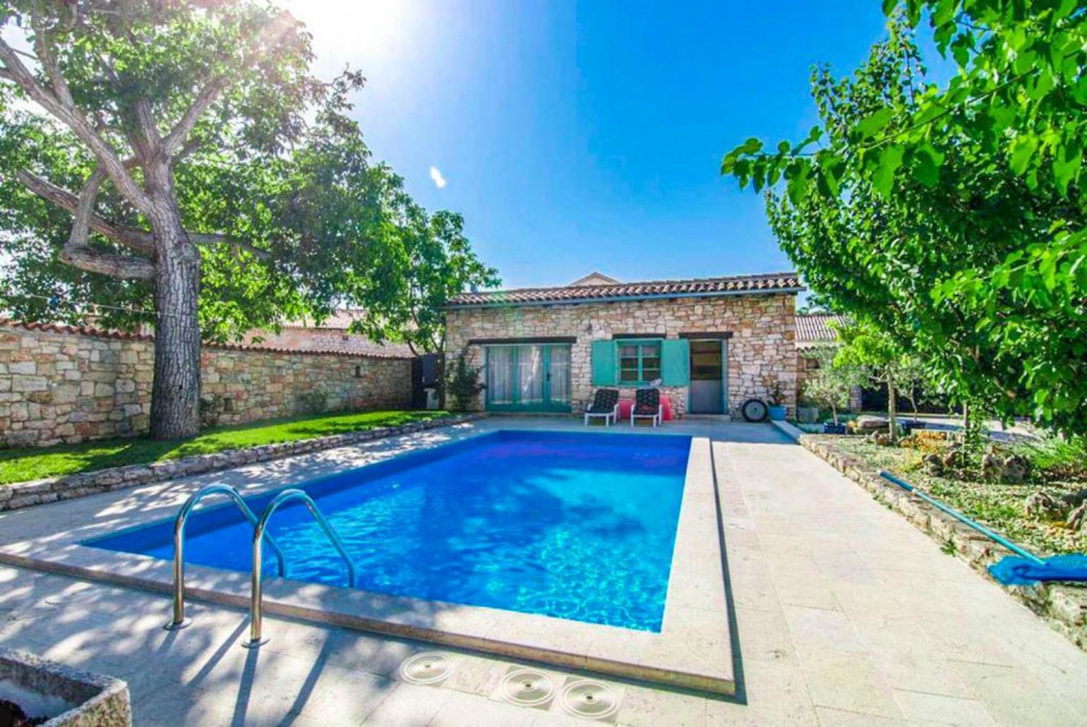 ,Beautiful villa with private pool, terrace, and garden