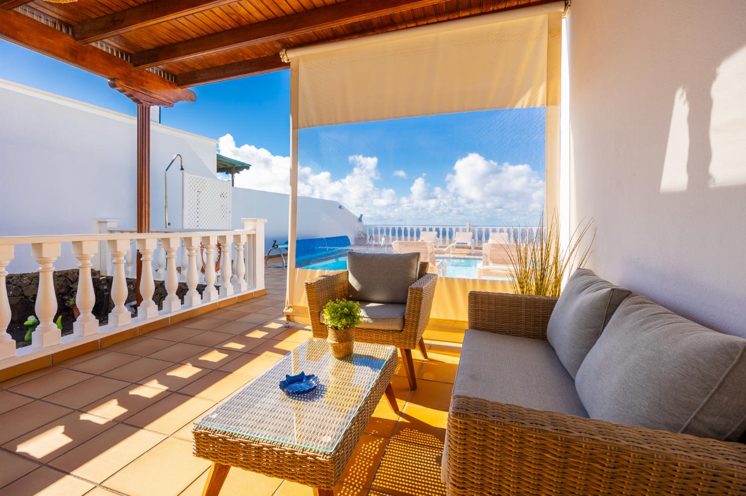 Sheltered terrace area with sea views
