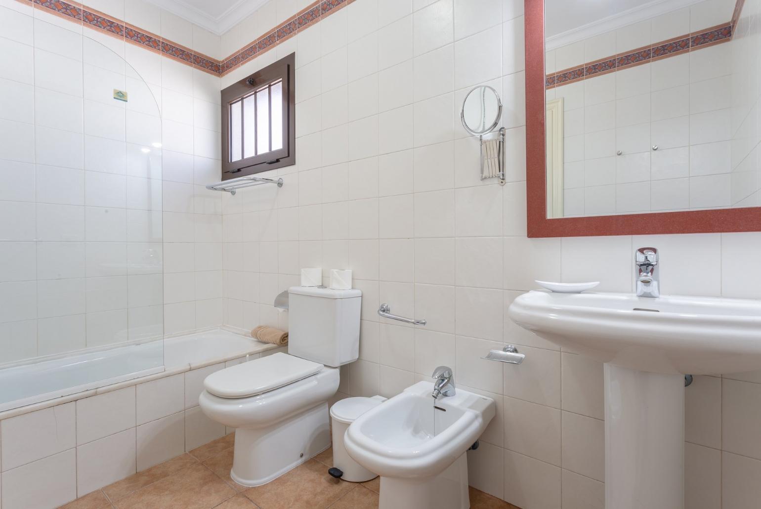 Family bathroom with overhead shower