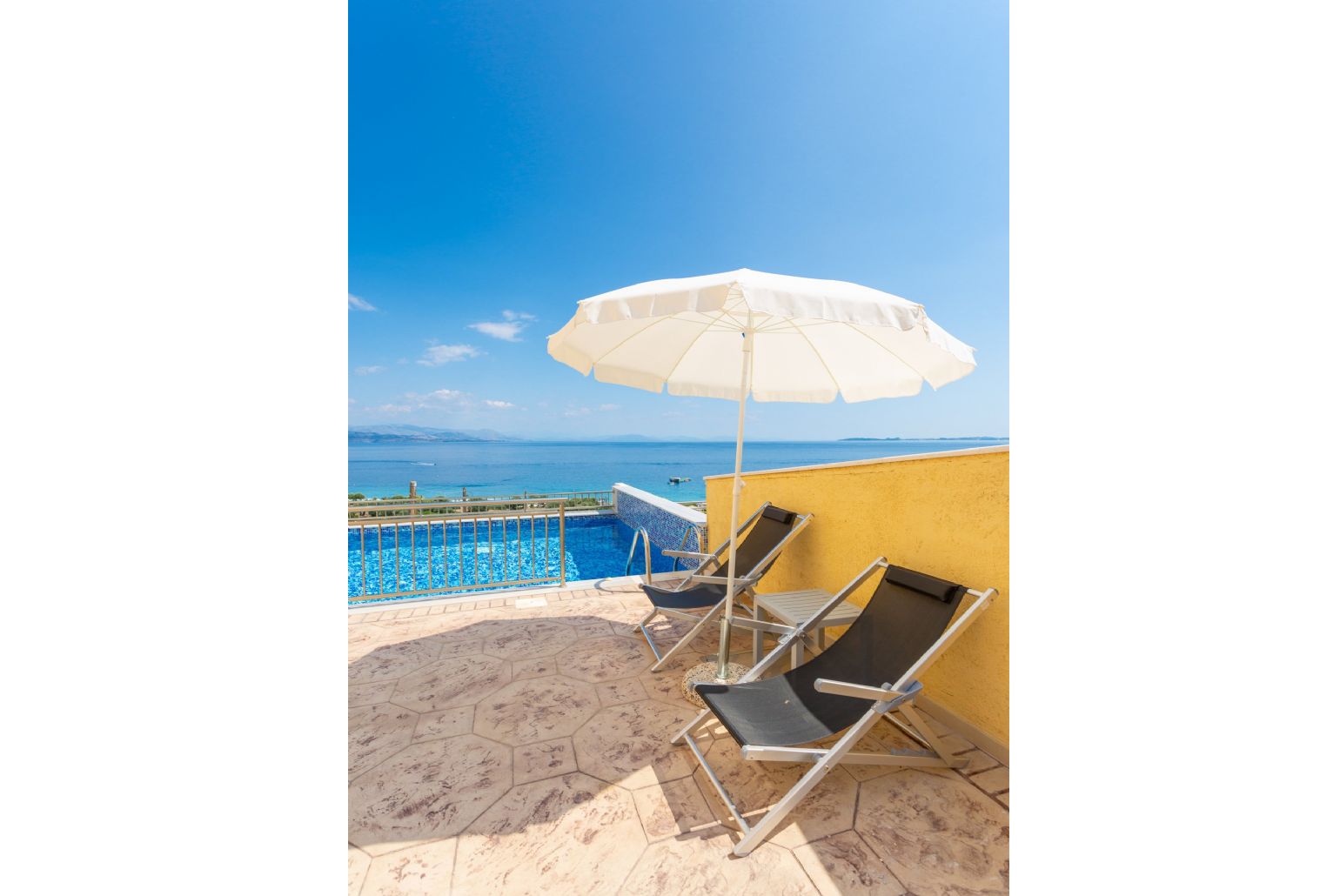 Terrace and private infinity pool with panoramic sea views