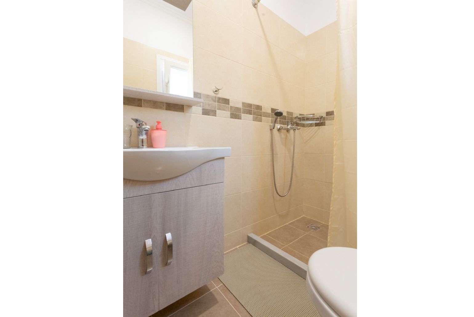 Family bathroom with overhead shower
