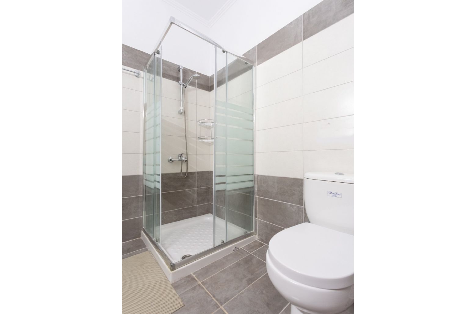 Family bathroom with overhead shower